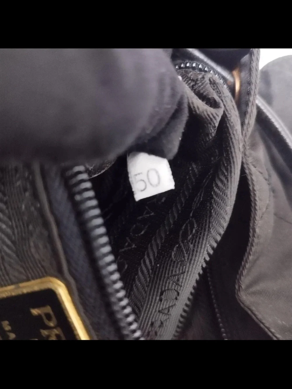 Prada Black Quilted Nylon Drawstring Backpack with Gold Hardware